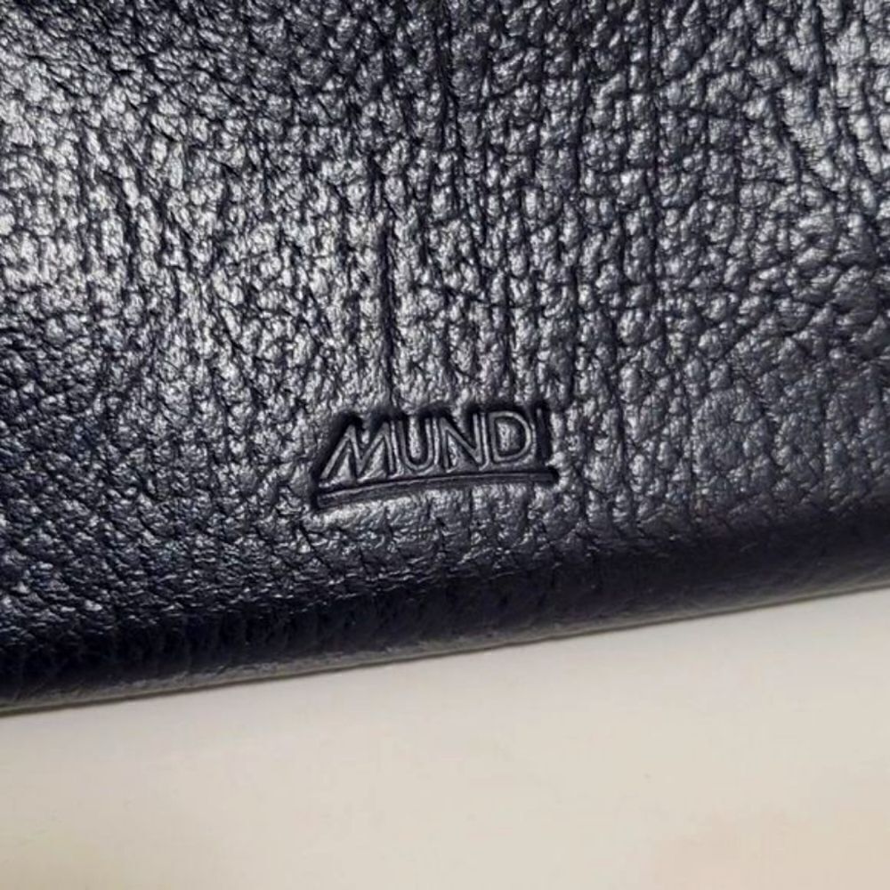 ‎Mundi blue leather wallets.